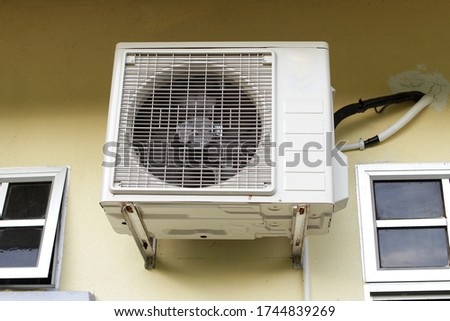 One external airconditioner unit mounted outside.