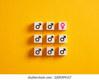 One Female Gender Symbol With Male Symbols On Wooden Blocks. Gender Discrimination In Employment, Recruitment Or Workplace Concept.