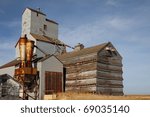 One of few remaining wooden prairie grain elevators on the Canadian prairies. This iconic prairie sentinel is abandoned at Bromhead Saskatchewan