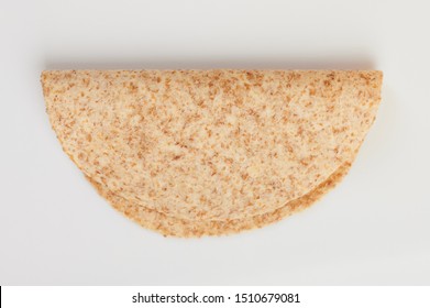 One Folded Tortilla  Above View Isolated On White Background