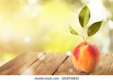 One fresh raw juicy peach with leaves - Shutterstock ID 1818936833