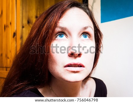 Similar – Hopeful Portrait of a Young Woman at the Window