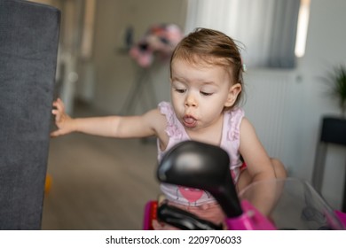 One Girl Close Up On Happy Playful Caucasian Toddler Having Fun Playing Alone At Home Copy Space In Summer Day Protruding Tongue Early Development Concept And Growing Up