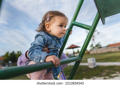 One Girl Small Caucasian Child Female Toddler 18 Months Old Having Fun In Park On The Slide In Day Childhood And Growing Up Concept Copy Space Climbing Up Development