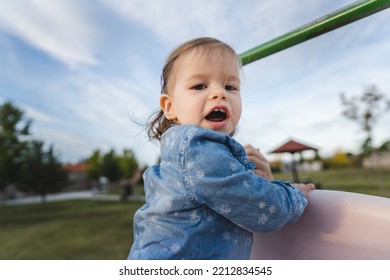 One Girl Small Caucasian Child Female Toddler 18 Months Old Having Fun In Park In Day Childhood And Growing Up Concept Copy Space