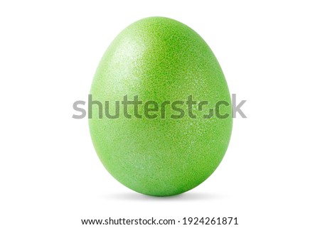 One Green Easter egg isolated on white background. Single vertical brightly painted egg for happy easter