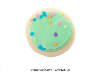 One Green Frosted Sugar Cookies Sprinkles On Top Isolated On White Background.