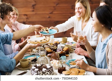 One Of Guests Asking For Slice Of Sweet Pie During Home Celebration Of Holiday By Festive Table