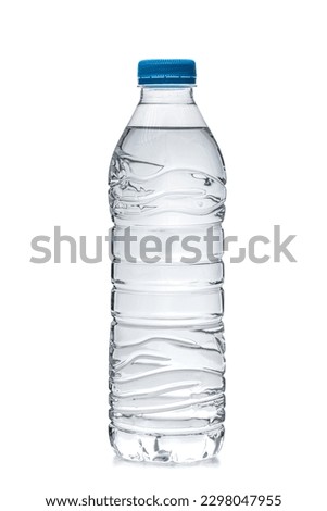 one half litre plastic water bottle with blue cap isolated on white backgroubd