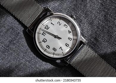 One Hand Automatic Mechanical Wrist Watch In Stainless Steel Case. Closeup Photo