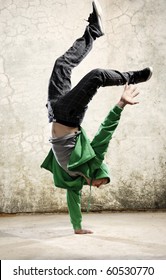 One hand handstand hip hop dancer