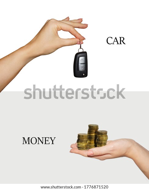  one
hand holds a stack of coins money the other hand holds car keys
sale purchase                            
