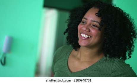 One happy black woman spontaneous laugh and smile - Shutterstock ID 2180948781
