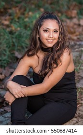 One Hawaiian Pacific Islander Girl Poses For High School Senior Portrait