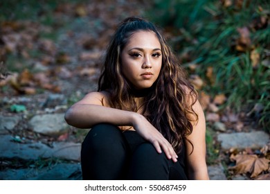 One Hawaiian Pacific Islander Girl Poses For High School Senior Portrait