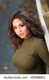 One Hawaiian Pacific Islander Girl Poses For High School Senior Portrait