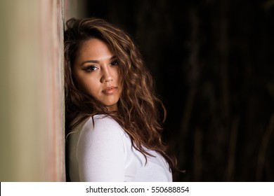 One Hawaiian Pacific Islander Girl Poses For High School Senior Portrait