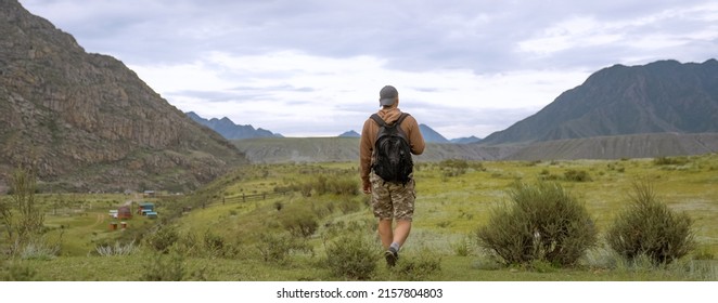 one hiker person walking in the countryside