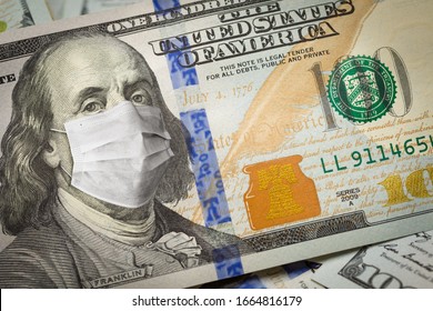 One Hundred Dollar Bill With Medical Face Mask On Benjamin Franklin.