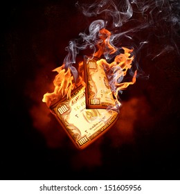 One hundred dollar burning banknote. Money concept