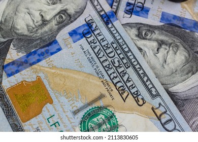 One hundred dollar paper bills of US money banknotes