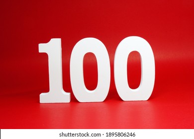 One Hundred ( number 100 ) word Isolated Red  Background with Copy Space - Discount 100% ( Percentage ) Safe Price Business finance promotion or anniversary celebration Concept 