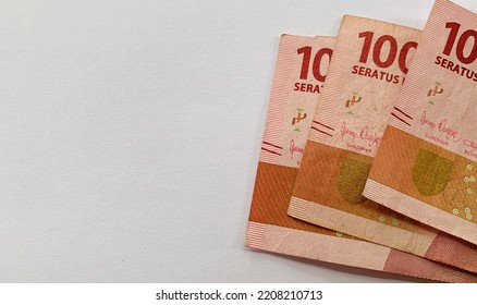 One hundred Rupiah Indonesian Currency on white paper background - Shutterstock ID 2208210713