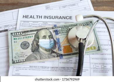 One Hundred Us Dollar With Face Mask On Insurance Paper Bill. Health Care Cost During Coronavirus Covid Outbreak Concept 