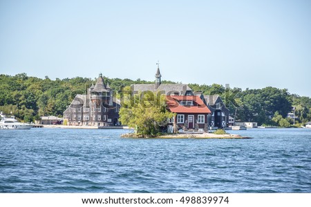 One Island with a small house in Thousand Islands Region in summer in Kingston, Ontario, Canada
