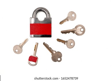 one key with red sticker among many keys which is the same color of padlock , mistake proofing or poka yoke concept as symbol for remind to use the right key ,isolated on white background - Shutterstock ID 1652478739
