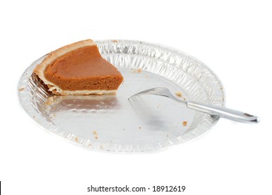 One Last Piece Of Pumpkin Pie On Tin Pie Plate With Fork