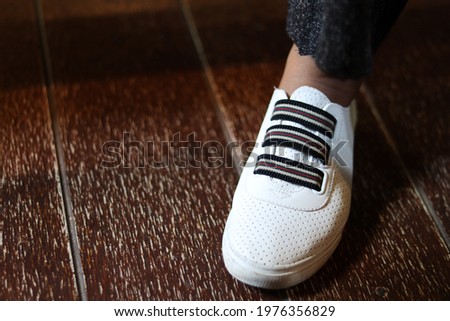 one left white woman shoe casual