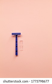 One Male And Female Razor To Remove Excess Body Hair On A Pink Background