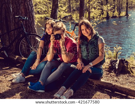 Similar – Frauenfreunde lachend bei Spaziergängen im Wald