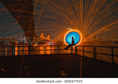 One man is creating light from a spin of energy.