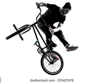 one  man exercising bmx acrobatic figure in silhouette studio isolated on white background