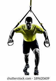 One  Man Exercising Suspension Training Trx On White Background