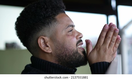 One Man Praying To God A Latin Hispanic Person Prays Having HOPE