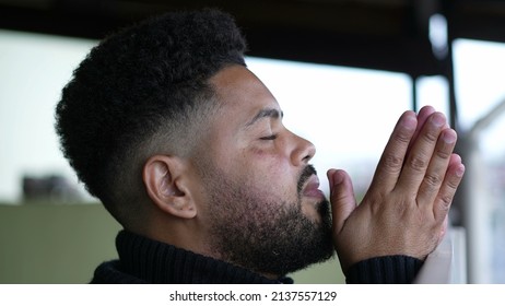 One Man Praying To God A Latin Hispanic Person Prays Having HOPE