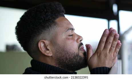 One Man Praying To God A Latin Hispanic Person Prays Having HOPE