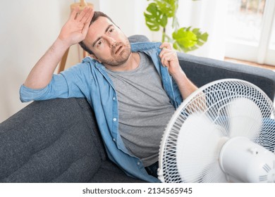 One Man Suffering Summer Heat At Home Trying To Cool Off