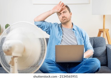 One Man Suffering Summer Heat At Home Trying To Cool Off