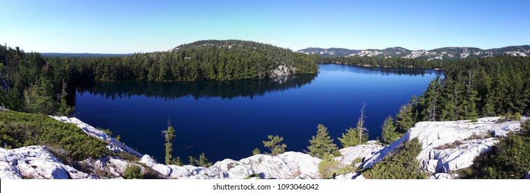 One Of The Many Beautiful Blue Lakes In The Killarney National Park, Ontario, Canada