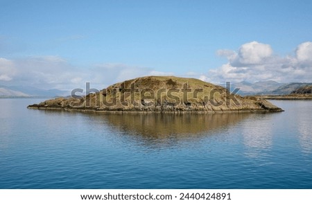One of many small islands in the Firth of Lorne, Argyll and Bute, Scotland, Europe on Wednesday, 20th, March, 2024
