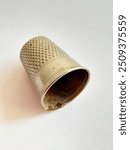 One metal thimble isolated with white background