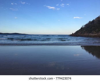 One Mile Beach Reflections On A Clear Afternoon. 