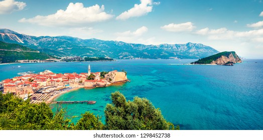 One of the most attractive city of Montenegro - Budva, old medieval town on the coast of Adriatic sea. Aerial summer panorama of Mediterranean countries. Traveling concept background.