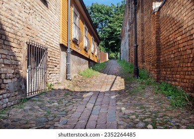 One of the narrowest streets in Riga. Latvia. The street is located in the old neighbourhood of the city, which was built in the 19th century.
