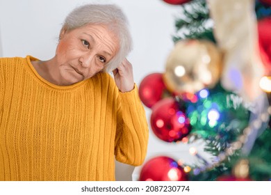 One Old Woman Feeling Sad And Depressed During Christmas