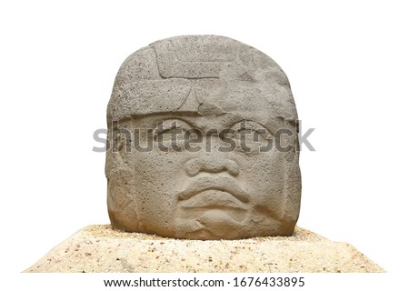One of the Olmec colossal heads isolated on white background. They are stone representations of human heads sculpted from large basalt boulders by Olmec civilization (Mexico)